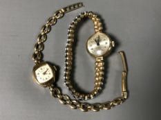 Two 9ct gold lady's watches - one on expansion bracelet and one by Rotary with metal core integral