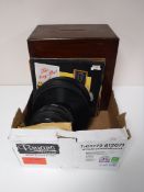 A box containing a mahogany storage box, containing a quantity of 78's, assorted LP's,