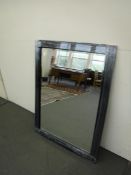 A 120 cm x 180 cm two tone glass mirror.