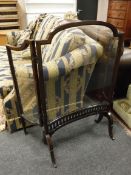 A Victorian glazed triple mahogany screen