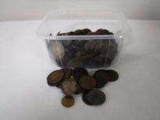 A tub containing a quantity of Victorian and Georgian pennies and half pennies