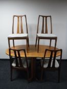 A six piece teak Parker Knoll dining room suite, comprising of display cabinet,