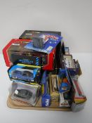 A tray containing boxed die cast vehicles, Burago, Matchbox,