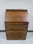 A mid twentieth century oak writing bureau