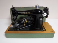 A mid 20th century Singer electric sewing machine