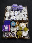 Two boxes containing Ringtons china including tea pots, caddies, mugs, etc,