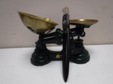 A reproduction German knife and a set of Librasco kitchen scales with weights
