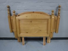 A 4' pine headboard together with a 3' pine headboard