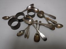 A set of four Georgian silver teaspoons, together with eight other silver teaspoons,