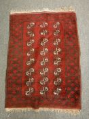 A fringed Bokhara design rug,