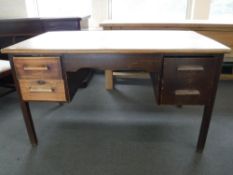 A mid 20th century oak desk