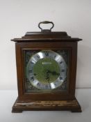 A Seth Thomas brass faced mantel clock