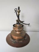 An antique copper ship's gas light