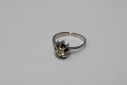 A white gold diamond solitaire ring, approximately 0.6ct, size N/O.