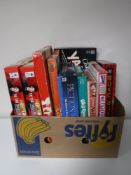 A large quantity of assorted board games together with a box containing playing cards and games