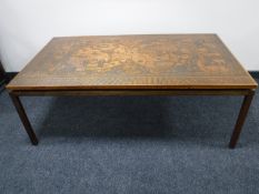 A Danish copper topped coffee table,