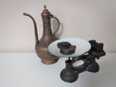 A set of vintage scales with weights together with an Eastern copper teapot