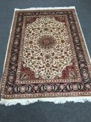 A Keshan design carpet 230 cm x 160 cm