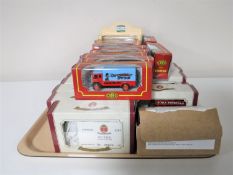 A tray containing thirty boxed diecast vehicles,