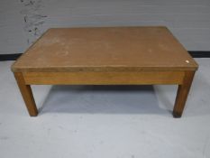 A mid twentieth century oak coffee table