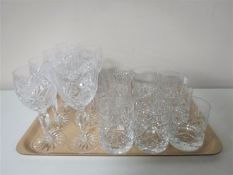 A tray containing a set of seven lead crystal Edinburgh International wine goblets together with a