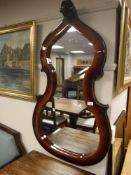 A contemporary cello mirror,