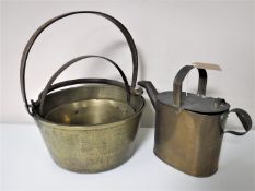 A copper watering can,