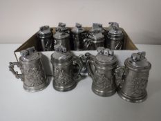 A box of twelve beer tankard table lighters