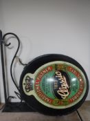 A Tuborg Pilsner pub advertising sign with metal wall bracket