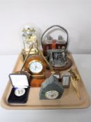 A tray containing a Jaguar letter opener, anniversary clock, carriage clock, desk clocks,