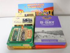 A tray containing seven diecast vehicles box sets including The D-Day Collection,