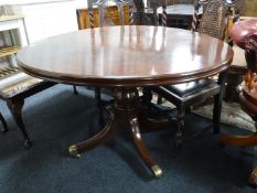 A circular Victorian mahogany breakfast table on pedestal support