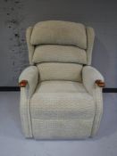 An electric reclining armchair