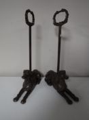 A pair of cast metal greyhound doorstops