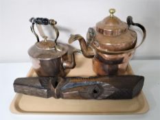A tray of two antique copper kettles together with a carved hardwood tribal mask