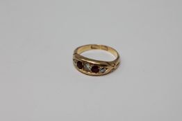 An antique 18ct gold ruby and diamond ring, 4.5g, size M.