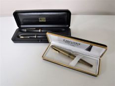 A pair of Parker Duofold fountain pens with 14ct gold nibs, boxed,