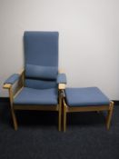 A beech framed adjustable armchair and stool upholstered in a blue fabric