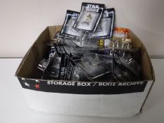 A box containing boxed De Agostini Star Wars figures
