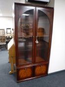 A Meredew glazed door display cabinet,
