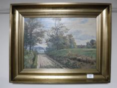 A gilt framed oil on canvas, 'Track Through A Rural Landscape' ,