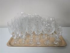 A tray containing a quantity of assorted drinking glasses including set of six champagne flutes,
