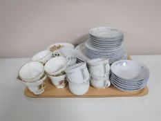 A tray containing a West German tea and dinner service,