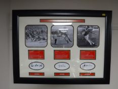A framed 'Welsh Rugby Legends' picture signed by Phil Bennett, John Davies and J.P.R.