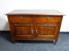An early twentieth century oak linen chest,