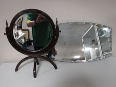 A circular mahogany dressing table mirror,