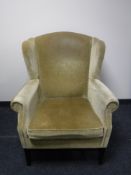 A mid twentieth century fireside armchair,