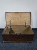 An antique pine blanket box