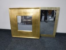 A gilt framed Victorian style bevel edged overmantel mirror