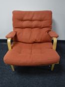 A beech framed armchair,